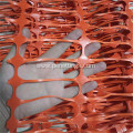 Orange plastic construction safety net